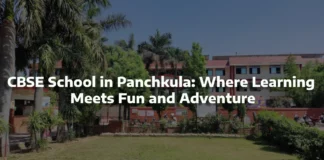 CBSE School in Panchkula: Where Learning Meets Fun and Adventure a green lawn with trees and buildings in the background