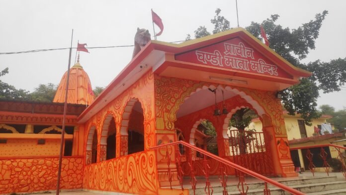 Ornate red and orange entrance gate of Prachin Chandi Mata Mandir, Chandimandir, Panchkula, after which Chandigarh is popularly said to be named