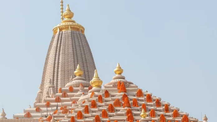 The shikhara and upper roof of the Shri Ram Janmabhoomi Mandir in Ayodhya, decorated with marigold garlands