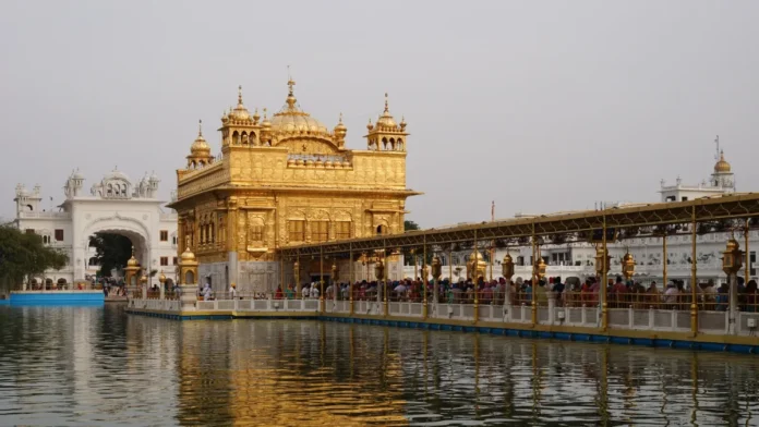 Golden Temple in Amritsar beside the sarovar on a clear day
