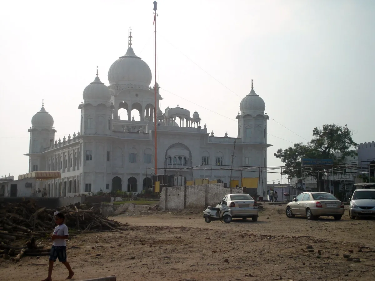 Nada Sahib Gurdwara, Panchkula: History, Timings And How To Reach 1 White domed building of Gurdwara Nada Sahib in Panchkula with a tall flag pole beside it