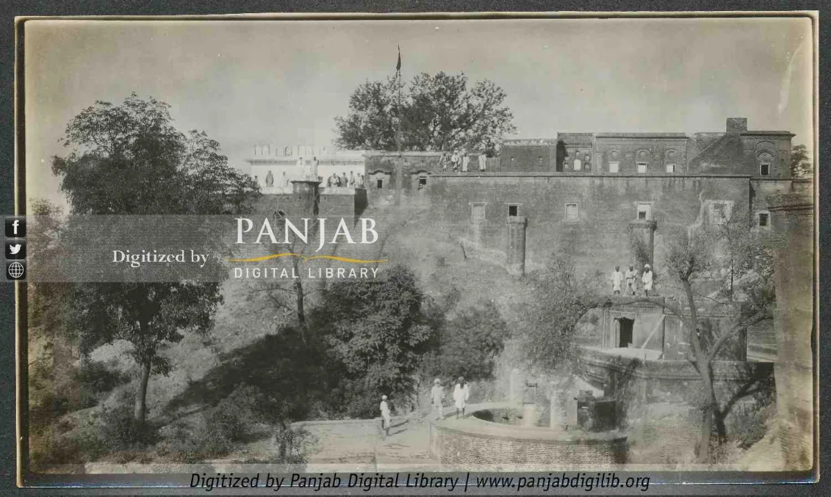 Virasat-E-Khalsa And The Forts Of Anandpur Sahib: Timings, Free Entry And Rules 2 Old black and white photograph of Qila Anandgarh at Anandpur Sahib showing a tall walled building on a hillside with trees, steps and a few men in white