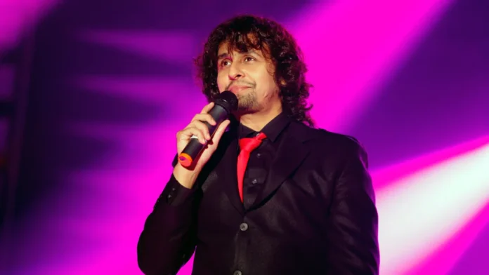 Sonu Nigam singing on stage at a live concert